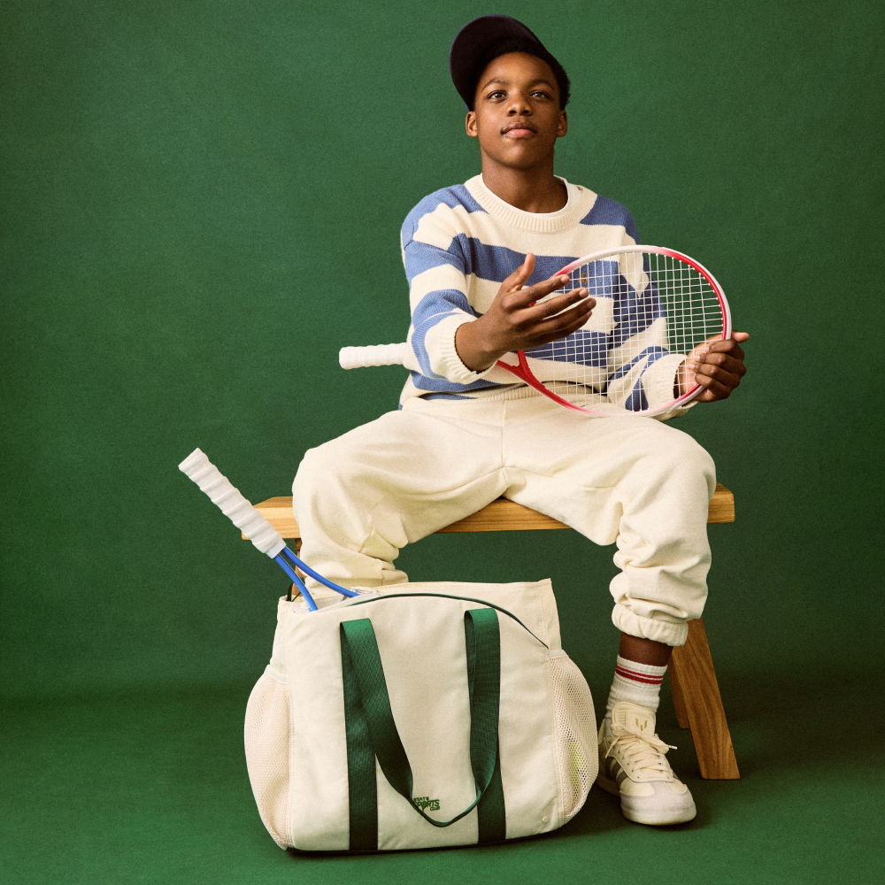 Boy sitting with STATE Bags Riley Tennis Bag Pristine Click to Zoom