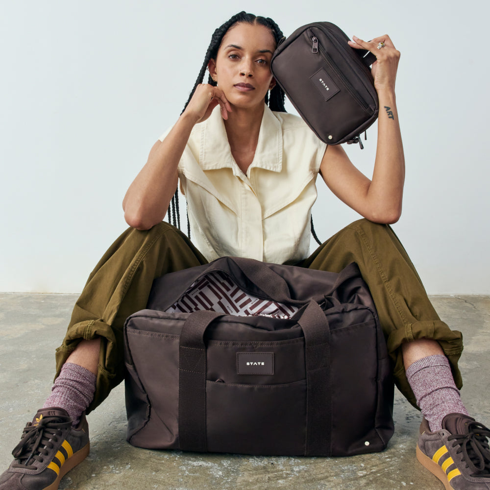 Woman wearing state bags wellington weekender brown