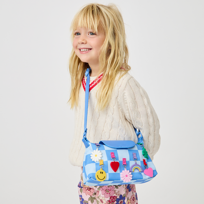 Girl wearing STATE Bags Chelsea Pouchette Charms Blue Check