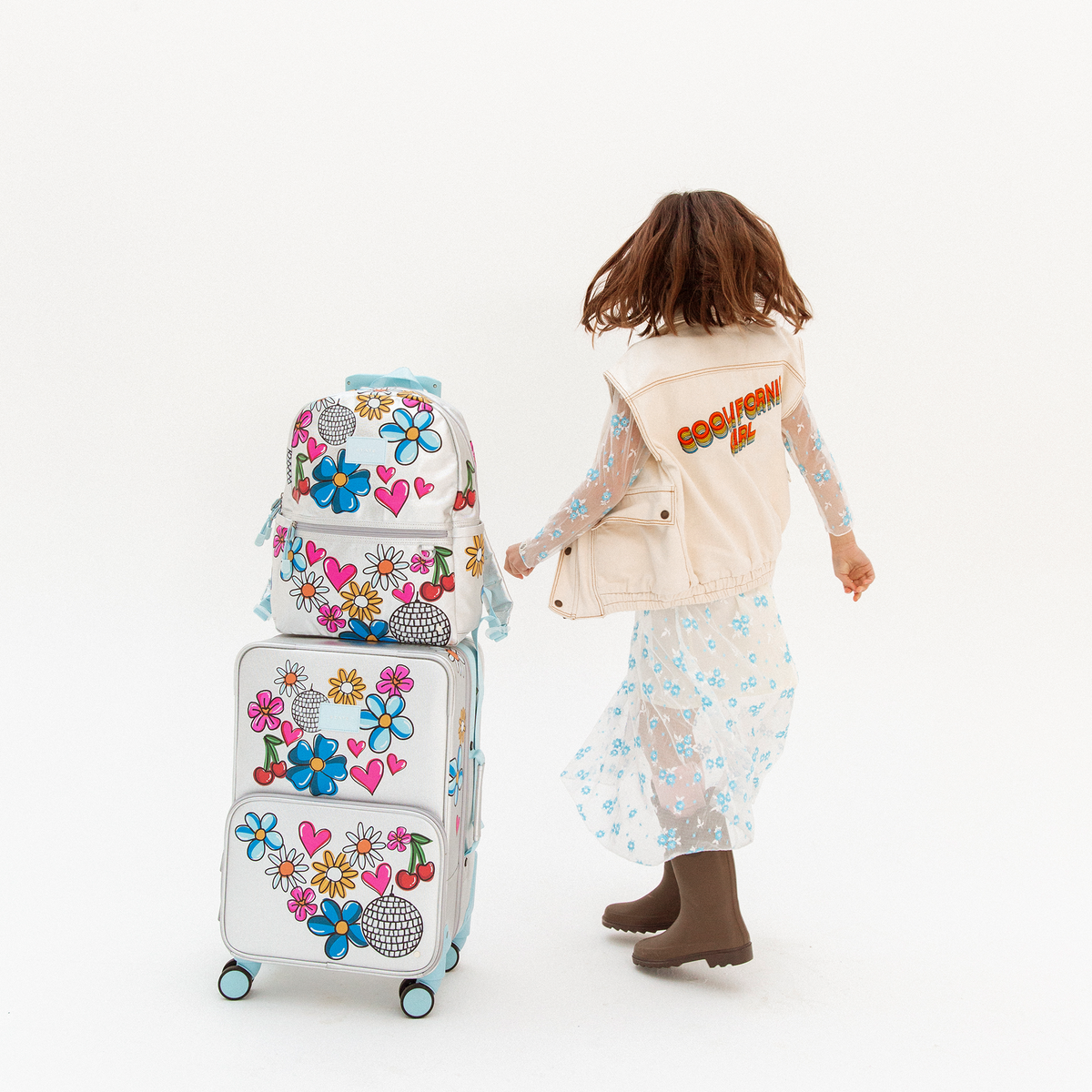 girl with STATE Bags Logan Carry-On Suitcase Graffiti