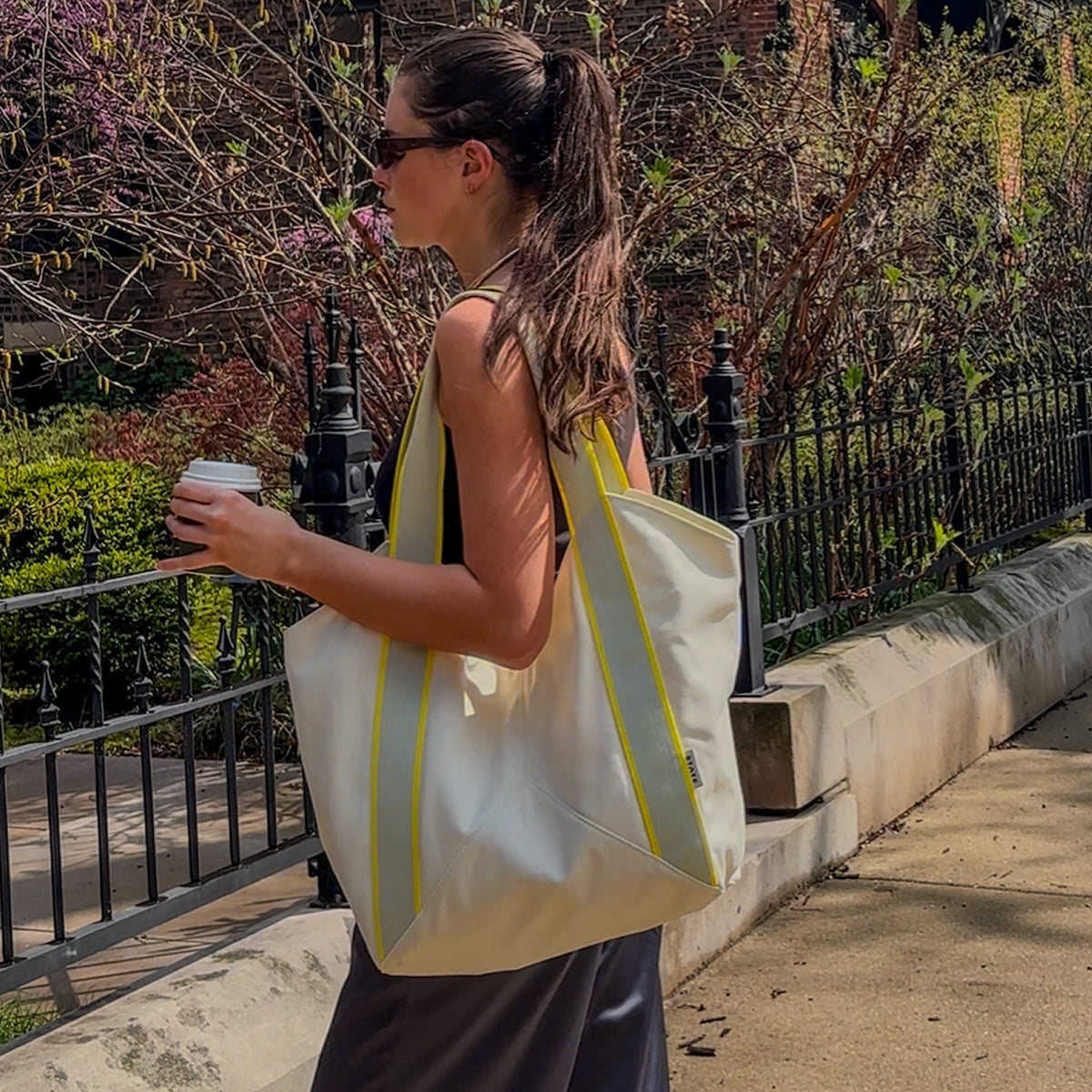 Woman wearing STATE Bags Beverly Tote Pristine