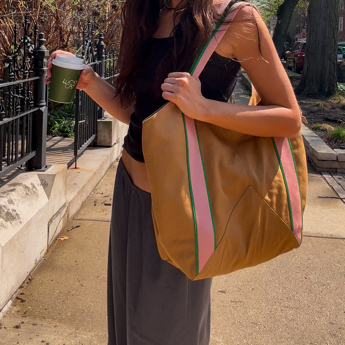 Woman wearing beverly tote canvas camel
