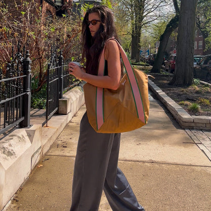 Woman wearing beverly tote canvas camel