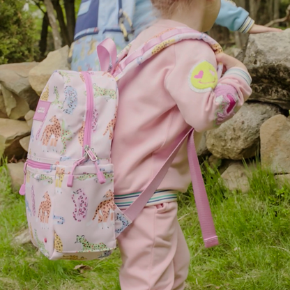 girl wearing STATE x MagneticMe Kane Mini Backpack leopards