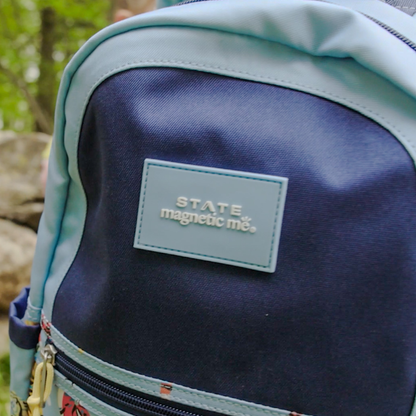 Boy wearing STATE x MagneticMe Kane Mini Backpack Tigers