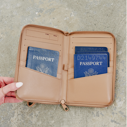 woman holding STATE Bags Passport Holder