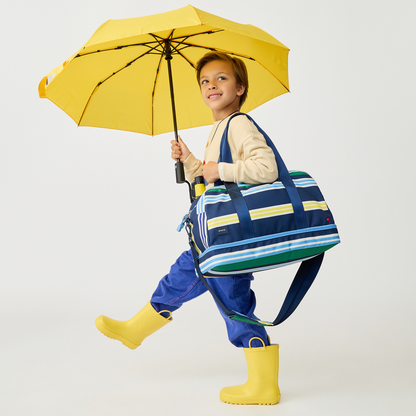Boy Wearing Wren Weekender Polo Stripe
